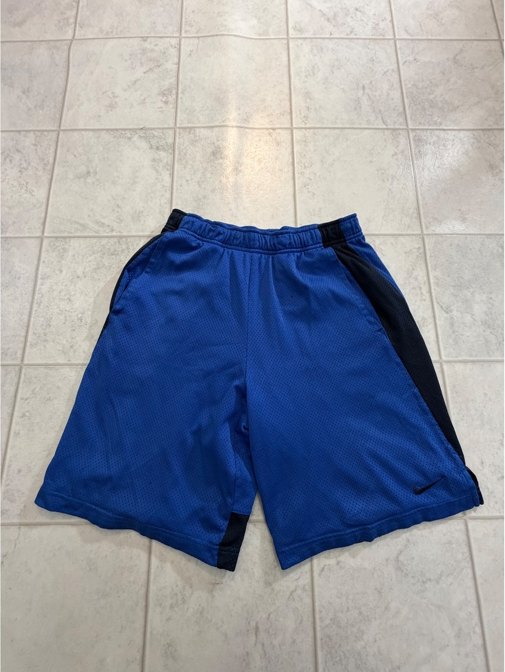 Nike blue and black mesh athletic shorts